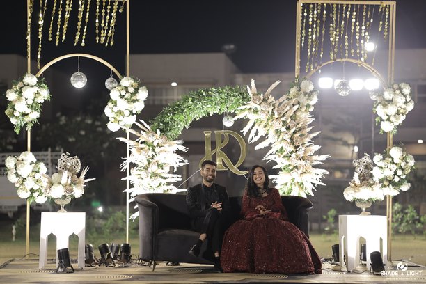 Couple seated at an evening sangeet